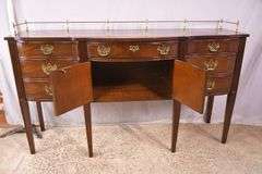 Thomasville cherry serpentine front sideboard with brass rail; 68-6940