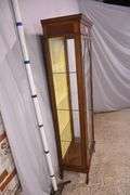 Tall narrow inlaid mahogany curio cabinet; 68-6863