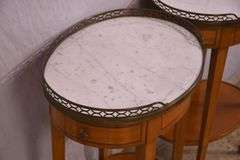 Pair of oval inlaid two-tier single drawer marble top side tables; 68-6885