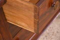 Early crotch mahogany 4 drawer chest with backsplash; 68-6860