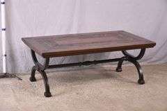 Large trestle base coffee table with slate tile accents on top; 21-2716