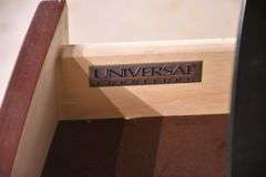 Pair of Universal carved mahogany bowfront bachelor's chests with black marble tops; 68-6869C