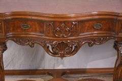Carved walnut serpentine front 3 drawer sideboard; 74-12809A