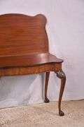 Carved mahogany flip-top table; 74-12753