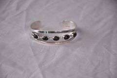 Sterling silver bracelet with sapphire stones; 155-1083
