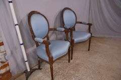 Pair of carved French style open armchairs; 68-6883