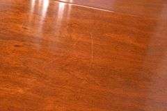 Oval mahogany dining table with 2 skirted leaves; 68-6585A