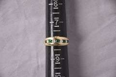 14kt gold ring with channel set emeralds and diamonds; 13227-003