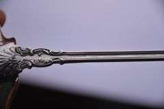 Large sterling silver ladle with gold wash interior; 971-274