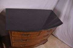 Pair of Universal carved mahogany bowfront bachelor's chests with black marble tops; 68-6869C