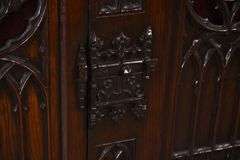 Lightolier carved oak gothic style radio cabinet; 68-6907