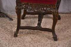 Carved oak high back accent chair with ornate stretcher base; 74-12804