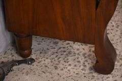 Early crotch mahogany 4 drawer chest with backsplash; 68-6860