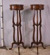 Pair of tall mahogany plant stands; 68-6923