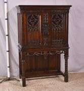 Lightolier carved oak gothic style radio cabinet; 68-6907