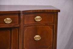 Baker inlaid mahogany serpentine front sideboard; 68-6955
