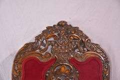 Carved oak high back accent chair with ornate stretcher base; 74-12804