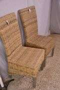 Pair of A & B Home woven dining chairs with distressed finish legs; 579-748B