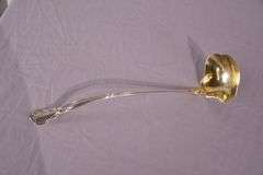 Large sterling silver ladle with gold wash interior; 971-274