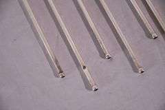 Set of 8 sterling silver shell-shaped sipper stirrers; 971-275