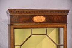 Tall narrow inlaid mahogany curio cabinet; 68-6863