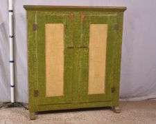 Early green and yellow distressed painted 2 door cupboard; 74-12760