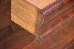 Early crotch mahogany 4 drawer chest with backsplash; 68-6860