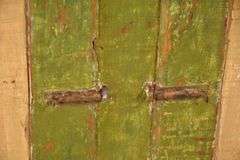 Early green and yellow distressed painted 2 door cupboard; 74-12760