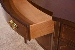 Baker inlaid mahogany serpentine front sideboard; 68-6955