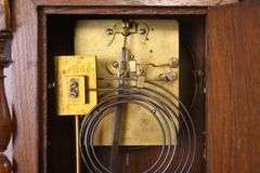 Winterhalder & Hofmeier Victorian era clock with carved oak case; 1086-017