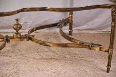 Large gold metal coffee table with glass top; 68-6890