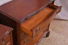 Pair of mahogany serpentine front 4 drawer bachelor's chests with brushing slides; 68-6916