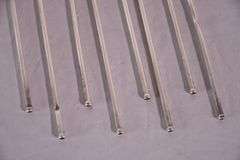 Set of 8 sterling silver shell-shaped sipper stirrers; 971-275
