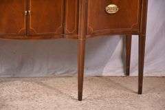 Baker inlaid mahogany serpentine front sideboard; 68-6955