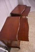Pair of mahogany serpentine front 4 drawer bachelor's chests with brushing slides; 68-6916