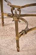 Large gold metal coffee table with glass top; 68-6890
