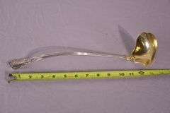 Large sterling silver ladle with gold wash interior; 971-274