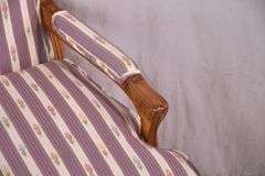 Edward Ferrell Ltd. carved French style open armchair with down cushion; 68-6917