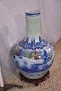 Large Oriental style ceramic floor vase with wooden pedestal; 68-6953