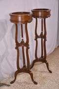 Pair of tall mahogany plant stands; 68-6923