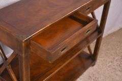 Campaign style three-tier bookcase console with 2 drawers; 68-6908