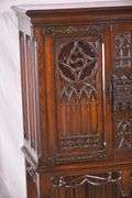 Lightolier carved oak gothic style radio cabinet; 68-6907