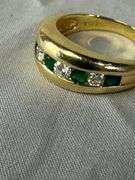 14kt gold ring with channel set emeralds and diamonds; 13227-003