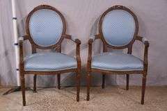 Pair of carved French style open armchairs; 68-6883