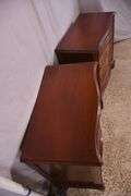 Pair of mahogany serpentine front 4 drawer bachelor's chests with brushing slides; 68-6916