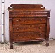 Early crotch mahogany 4 drawer chest with backsplash; 68-6860