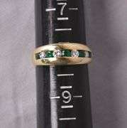 14kt gold ring with channel set emeralds and diamonds; 13227-003