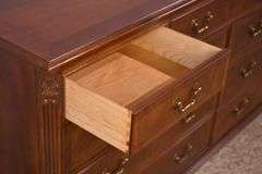 Ethan Allen inlaid crotch mahogany 9 drawer dresser; 68-6897C