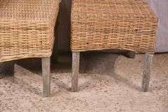 Pair of A & B Home woven dining chairs with distressed finish legs; 579-748B