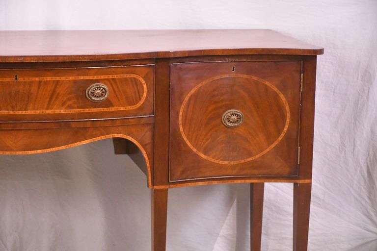 Inlaid crotch mahogany serpentine front sideboard; 74-12887
